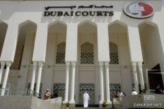 امرأة تهدد بتفجير حزام ناسف في مقر محاكم دبي والشرطة تتفاوض معها